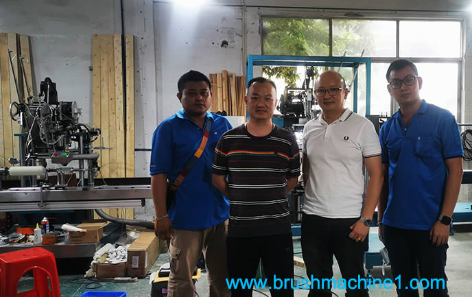 Thai customers and our General Manager were checking the roller brush machine together.jpg