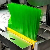 Making Plastic Handbrooms With Green Filaments