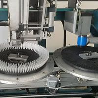 5-axis 3-head machine making disk brushes